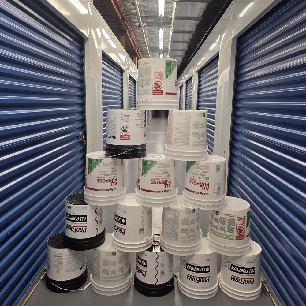 White and Black Paint Buckets